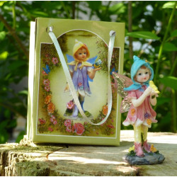 Fée miniature rose et son oiseau